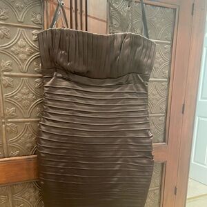 body hugging cocktail dress. worn with straps or straps. Very flattering.